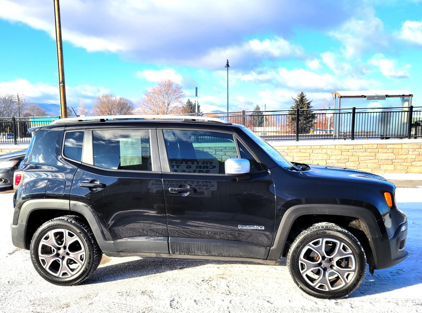 2015 Black /Black Jeep Renegade Limited (ZACCJBDT7FP) with an 2.4L I4 engine, 8 Speed Automatic transmission, located at 450 N Russell, Missoula, MT, 59801, (406) 543-6600, 46.874496, -114.017433 - 4 Wheel Drive. Automatic Transmission. Navigation. Heated Power Seats. Air. Cruise. Tilt. Backup Camera. AM FM XM. Bluetooth. Power Windows and Locks. Remote Start. - Photo#16